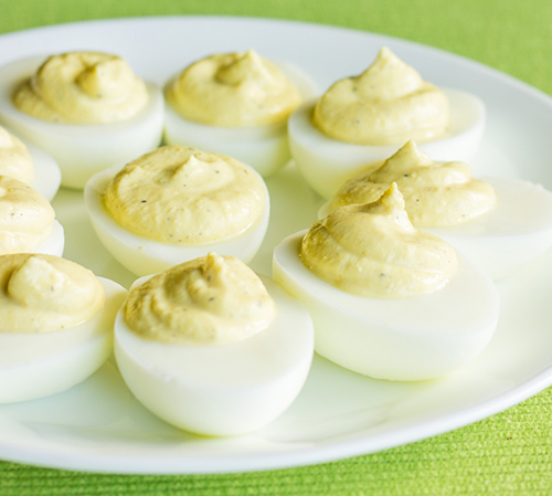 Recipe for Skinny Deviled Eggs by Amanda Finks at The Wholesome Dish